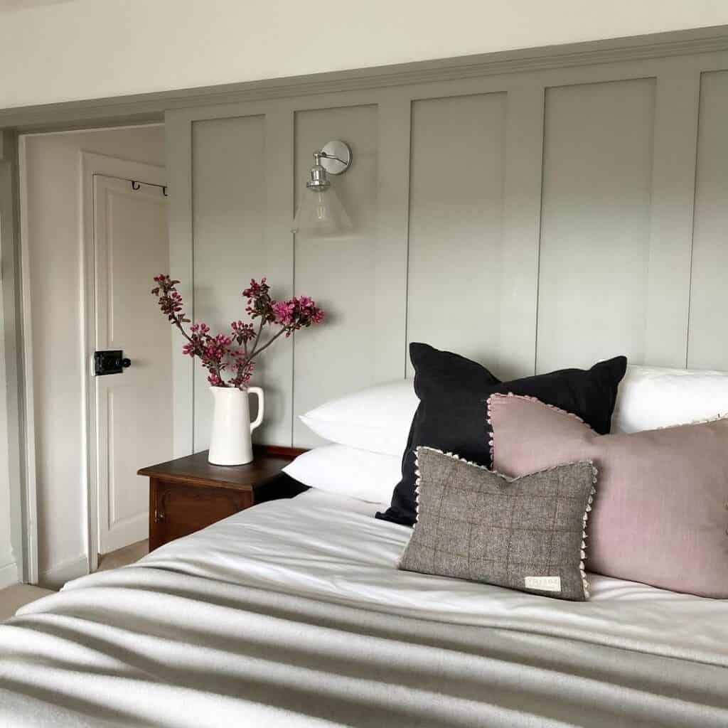 Light Gray Bedroom Wainscoting With Purple Accents