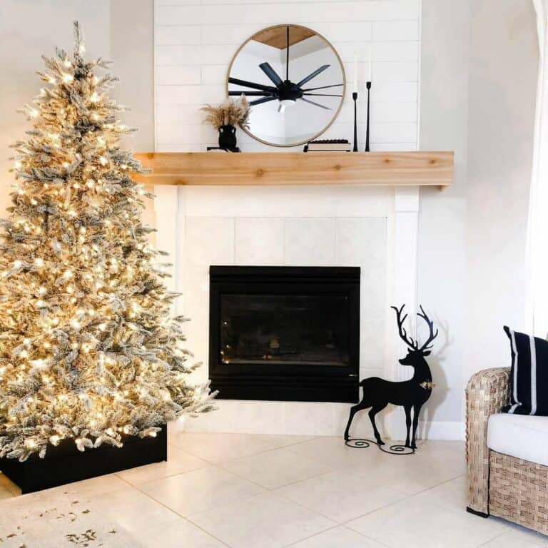 Light Gray Square Tile Fireplace With Black Reindeer Décor