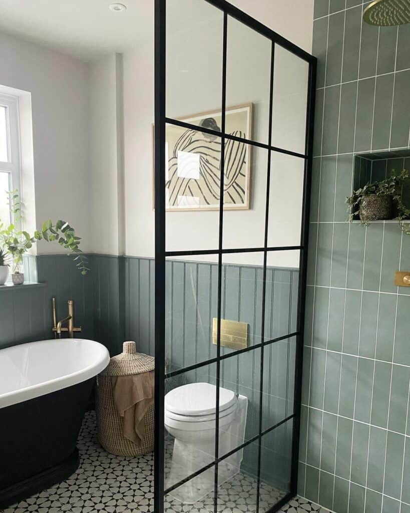 Light Green Bathroom Walls Surrounding the Deep Tub
