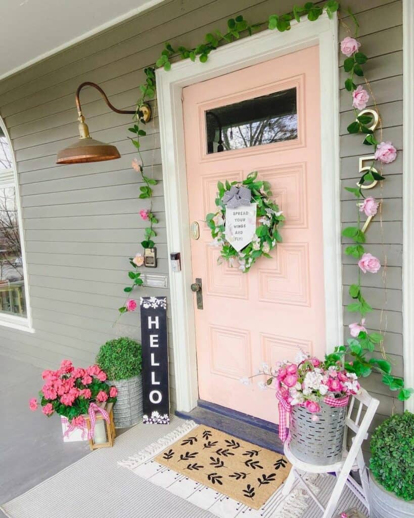 Light Pink Door With Pink Spring Front Door Décor