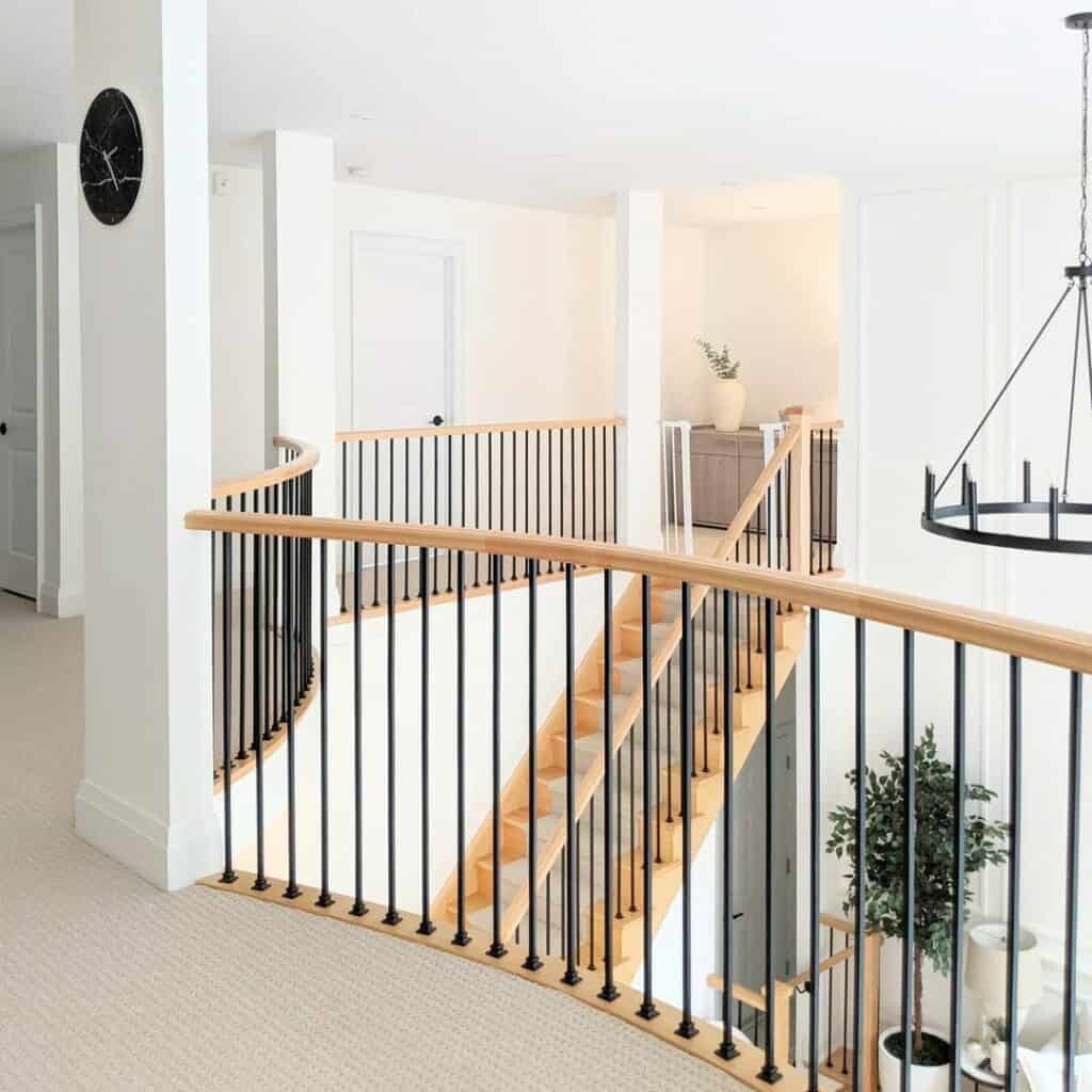 Light Wood Modern Farmhouse Staircase With Wagon Wheel Chandelier ...