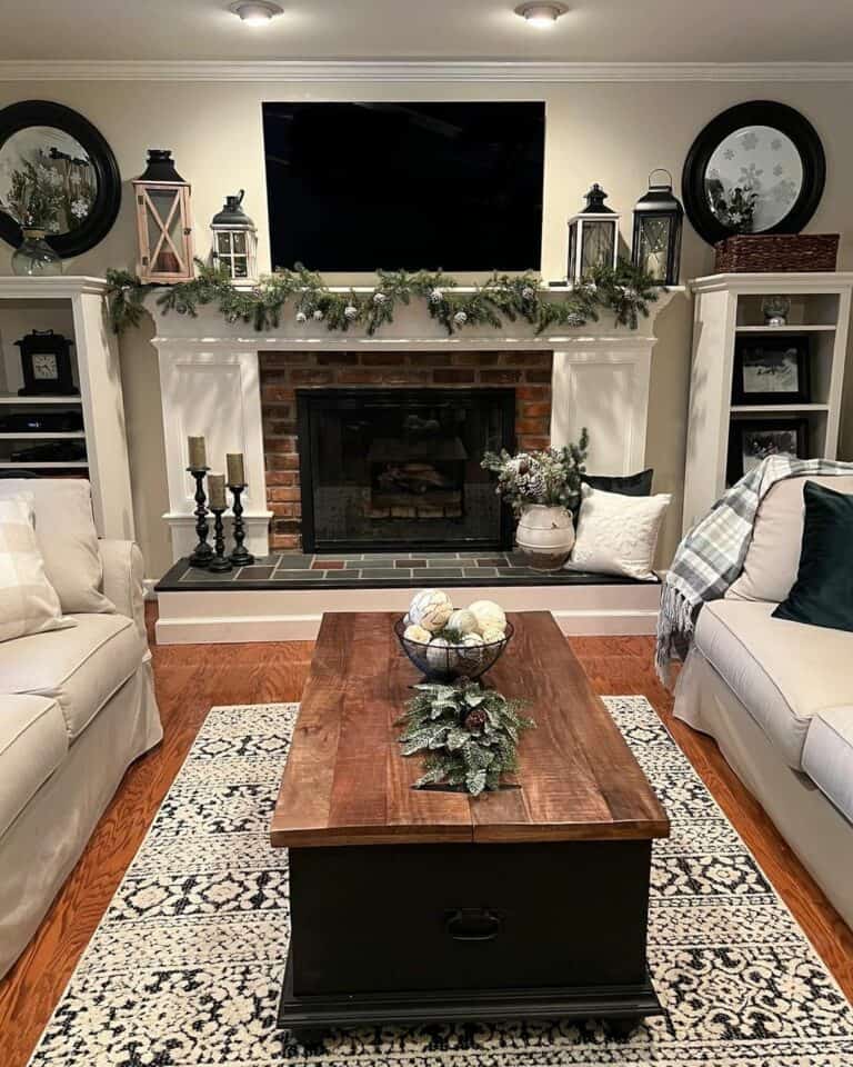 Living Room With a Brick-and-White Fireplace