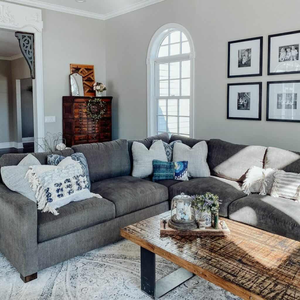 Living Room With a L-shaped Dark Grey Couch