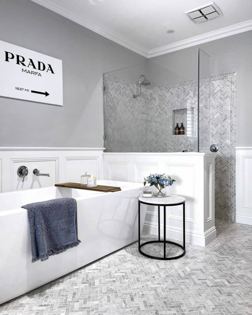 Luxurious Bathroom With Gray Chevron Tiled Floor