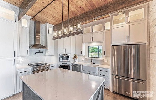 Minimalist Kitchen With Wood Panel Ceiling