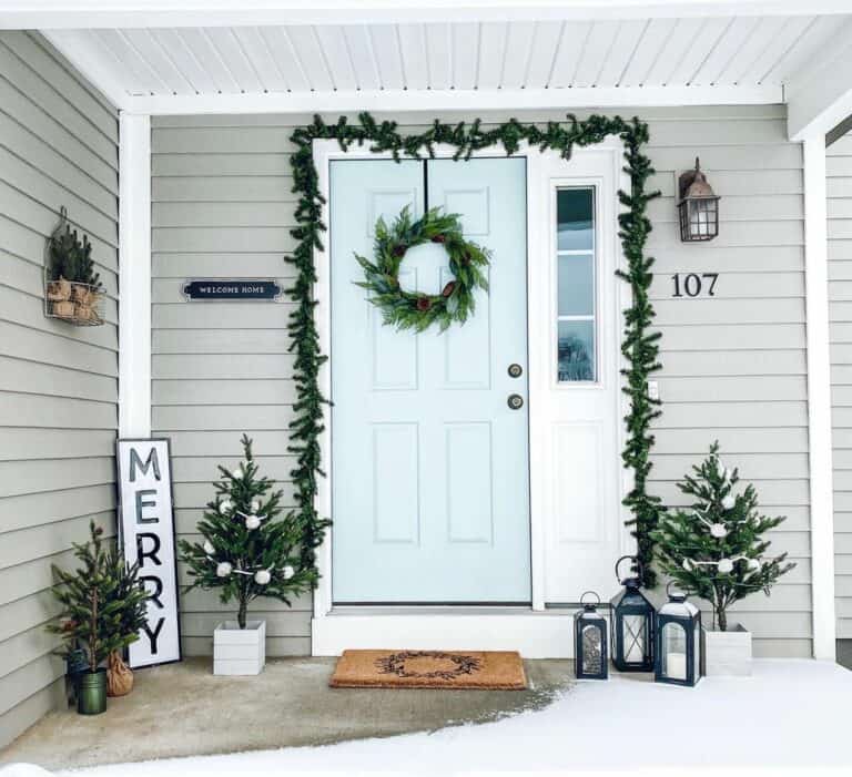 Mint Green Entrance Door With Pine Garland