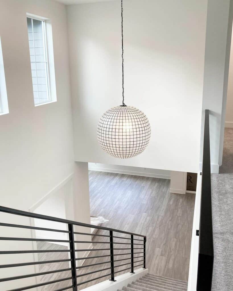 Modern Black Staircase With Hanging Light