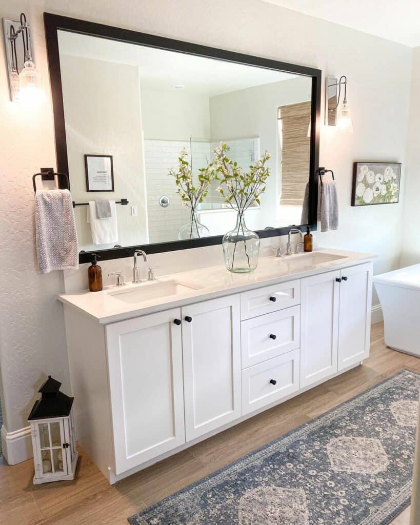 30 Bathroom Mirror Ideas To Accompany Your Vanity Modern Chrome Sconces Flank Framed Mirror 819x1024