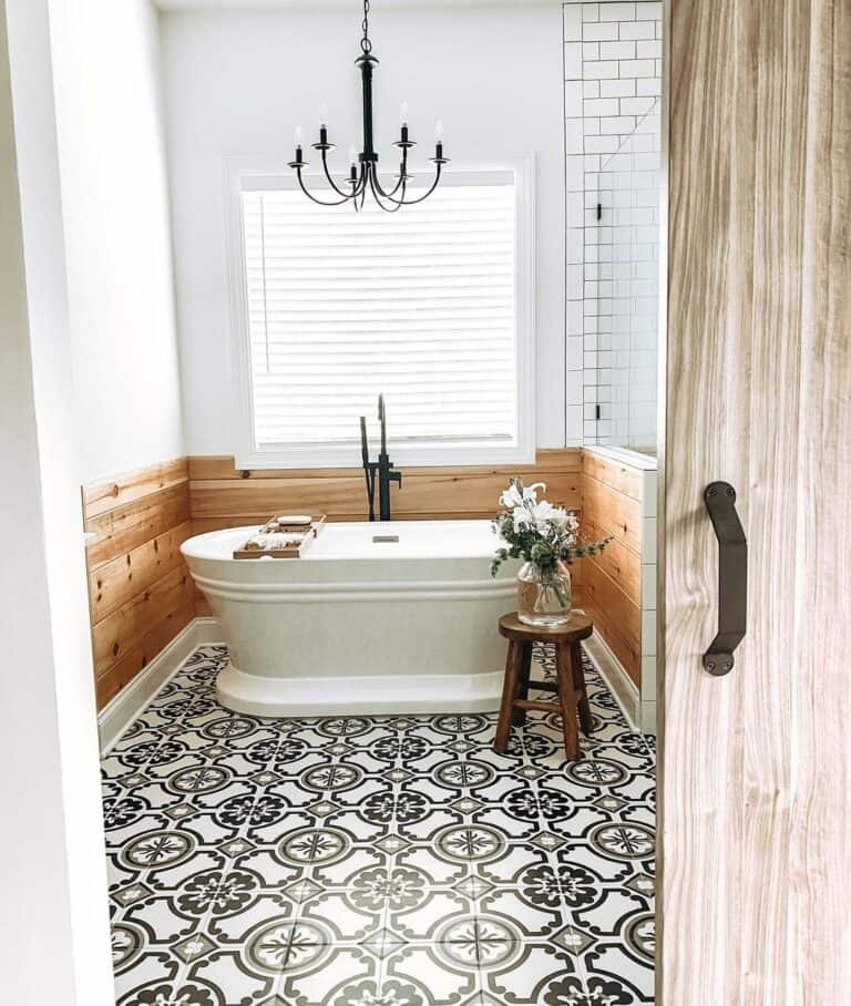 Modern Farmhouse Bathtub Surrounded by Warm Wood Wainscoting