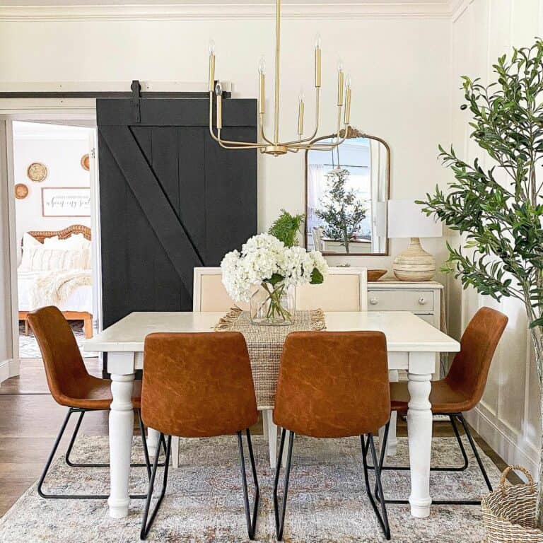 Modern Gold Chandelier Over Dining Table
