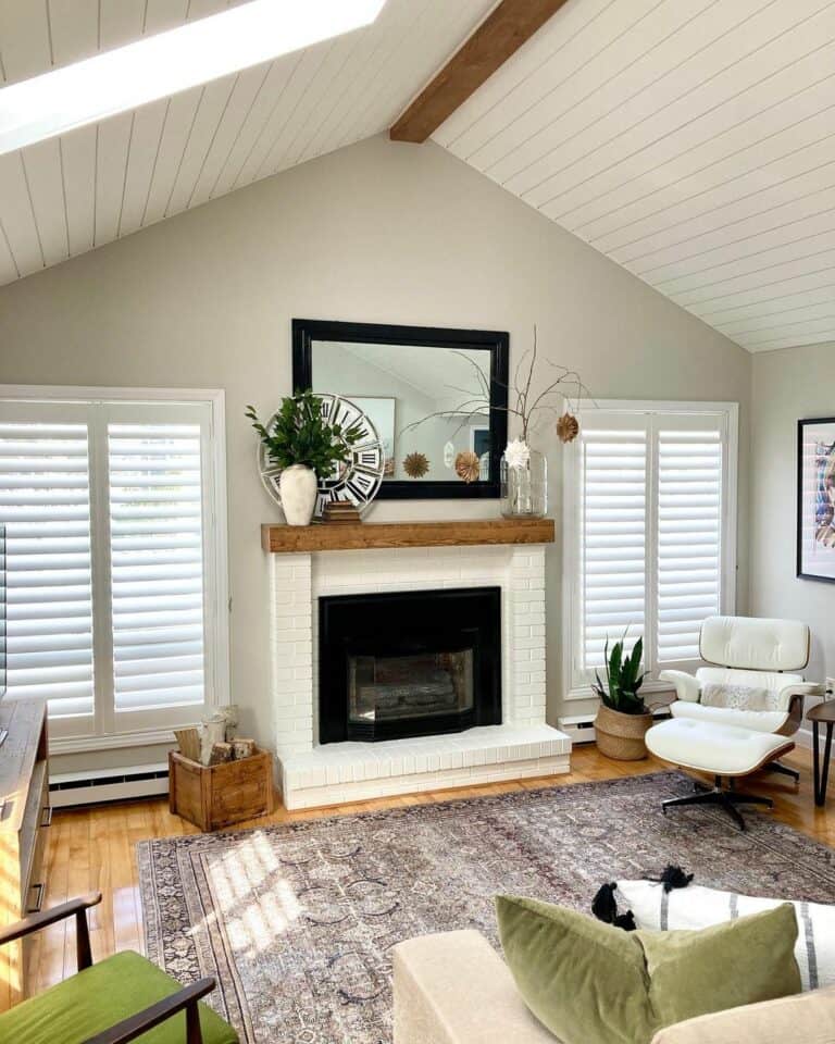 Modern Living Room With White Stone Fireplace
