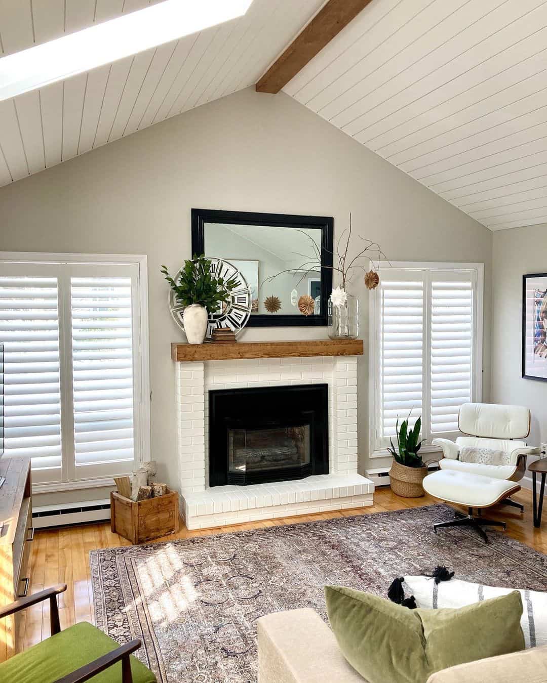 Modern Living Room With White Stone Fireplace - Soul & Lane