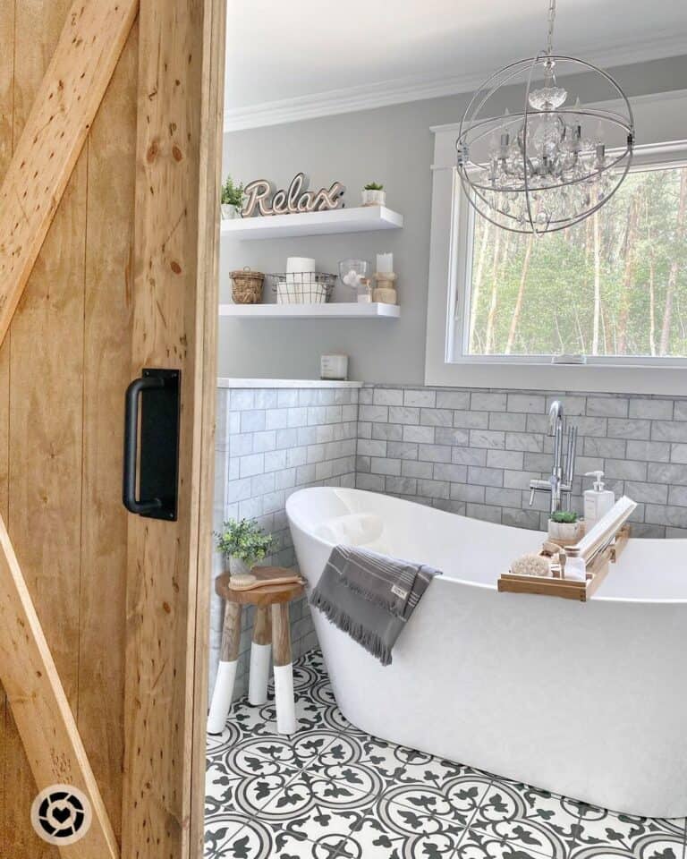 Modern White Bathtub Surrounded With Light Gray Subway Tile