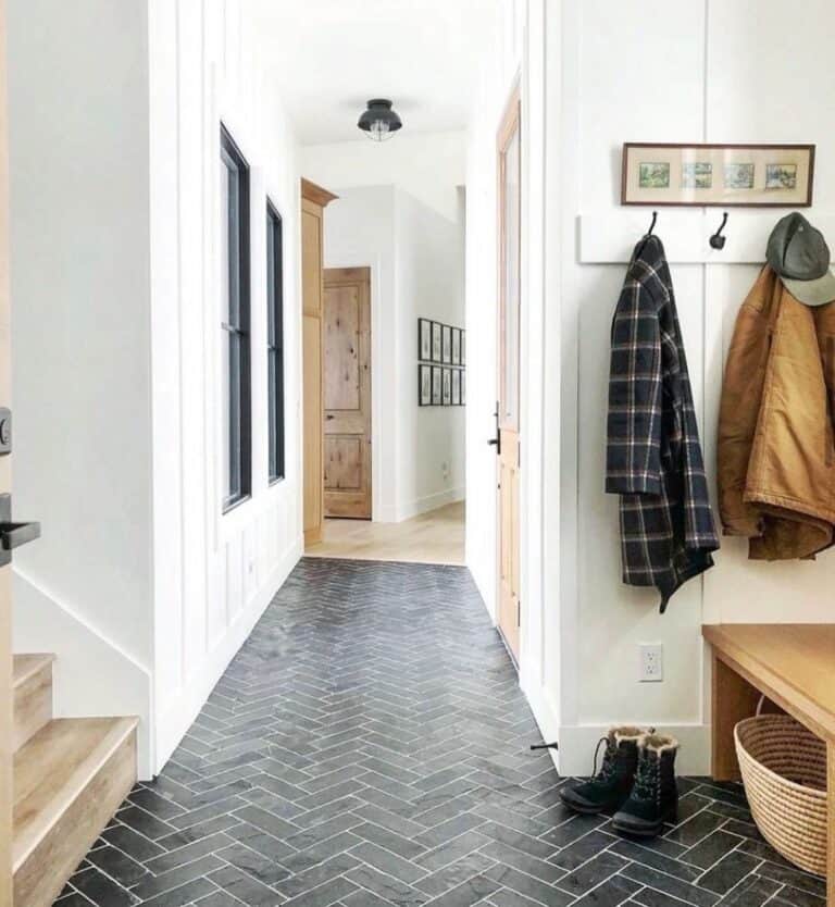 Monochrome Entryway With Wooden Touches