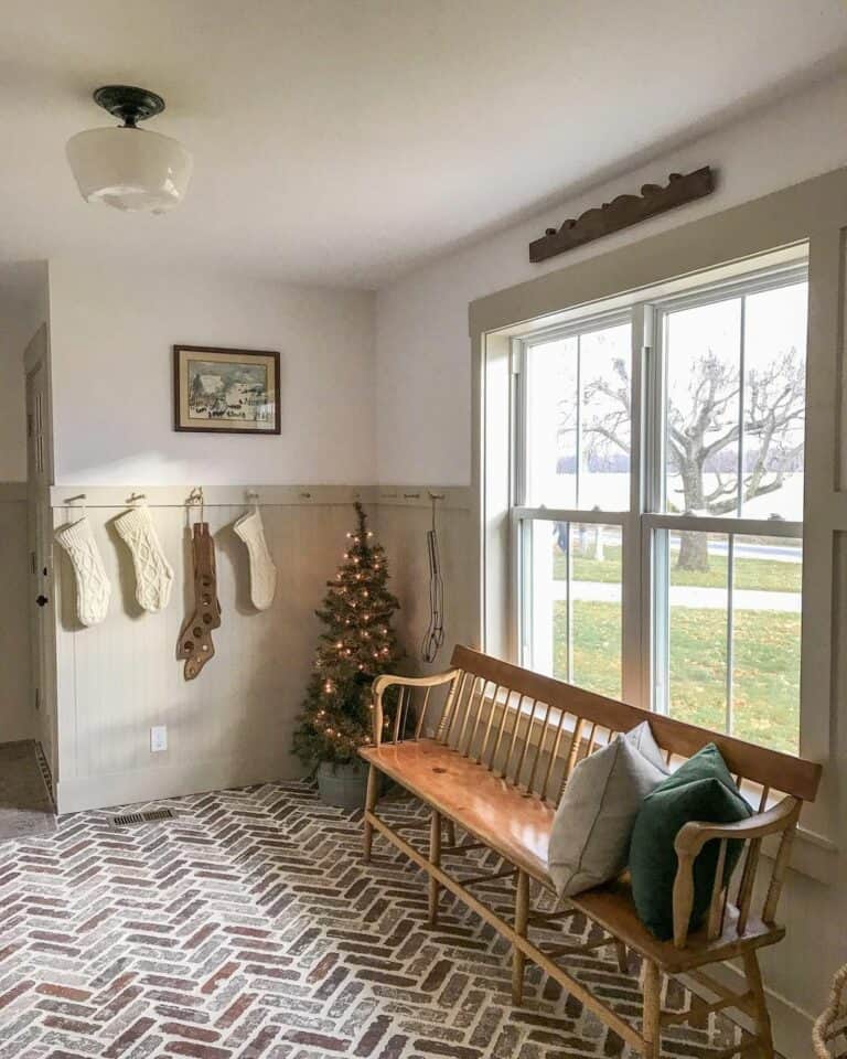 Mudroom With Brick Floor and Wainscoting