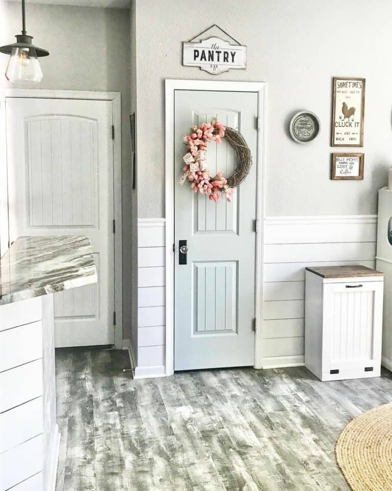 Narrow Gray Pantry Door With Pink Floral Wreath