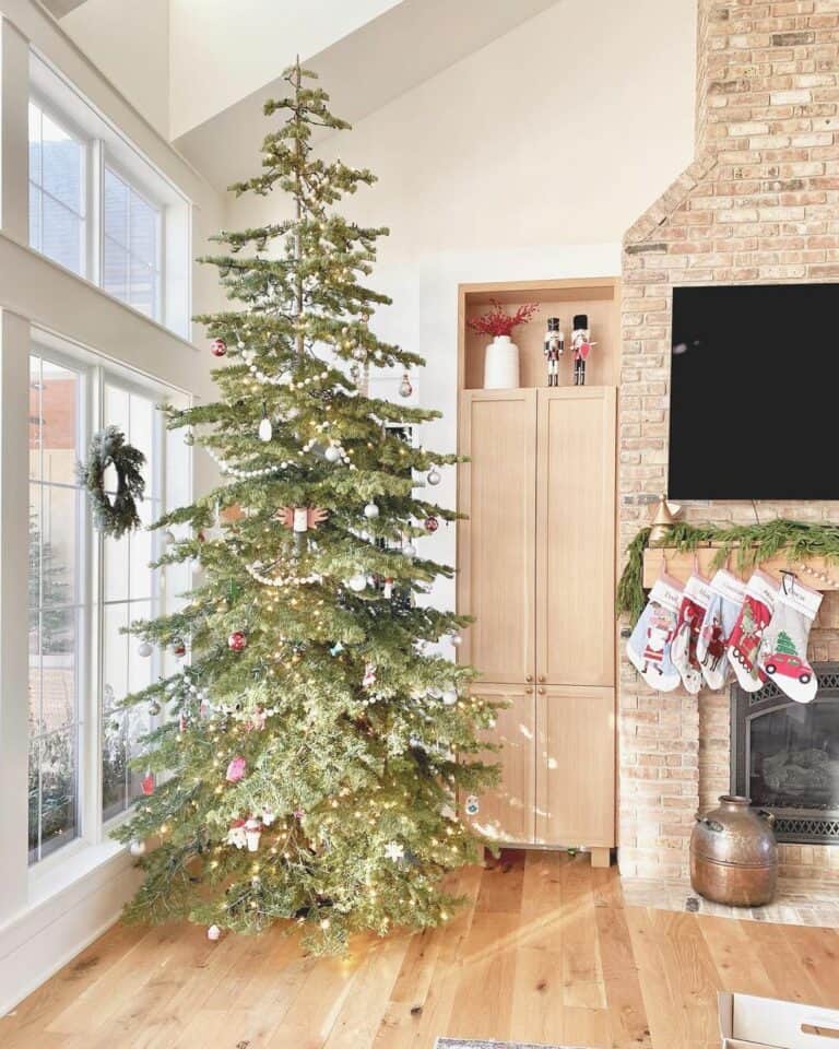 Natural Wood and Brick Living Room With Christmas Décor