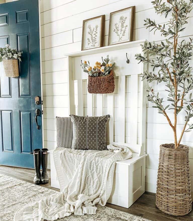 Navy and White Entryway With Rattan Baskets