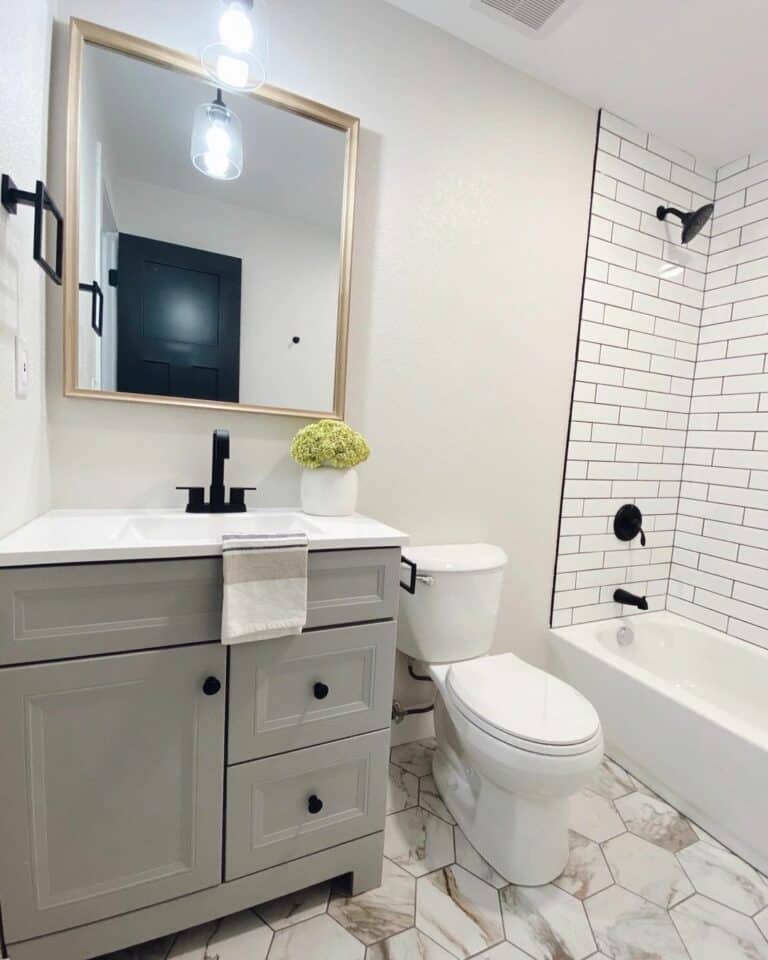 Neutral Bathroom With Subway Tile Wall