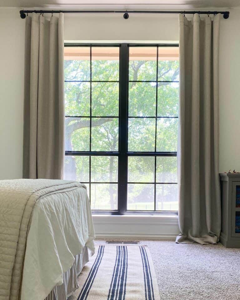 Neutral Minimalist Bedroom With Classic BlackWindow Grids