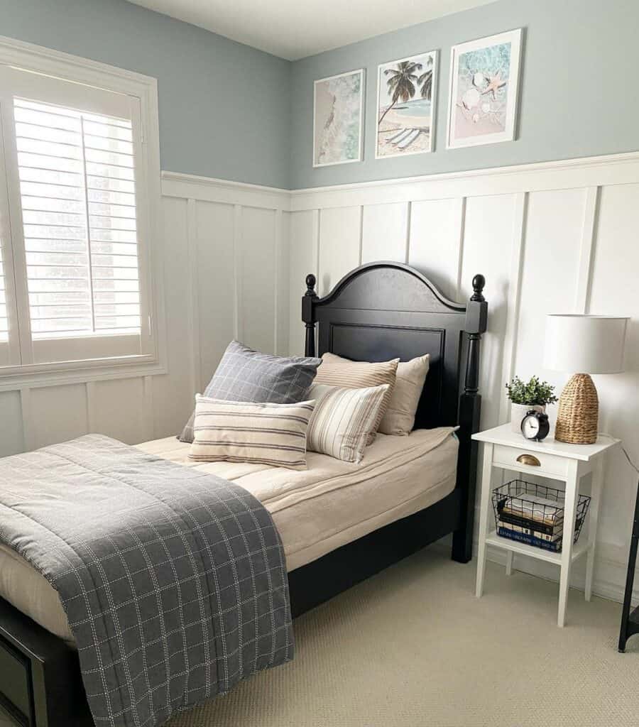Pale Blue Coastal Bedroom With White Wainscoting
