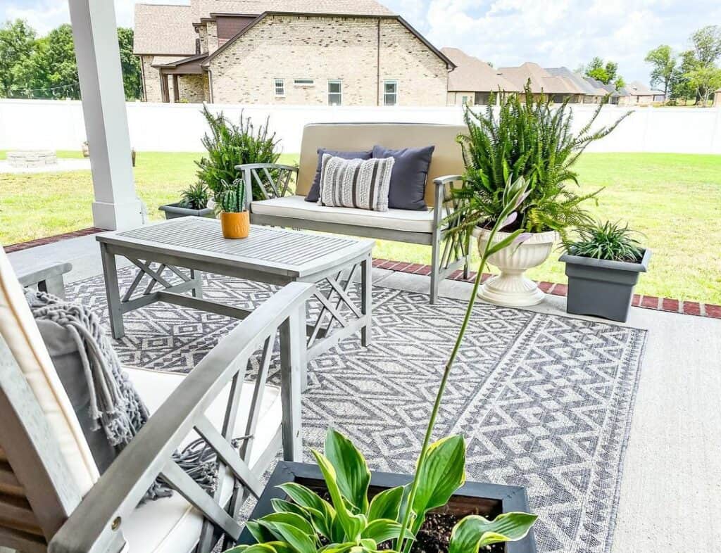 Planters Paired With Gray Patio Furniture