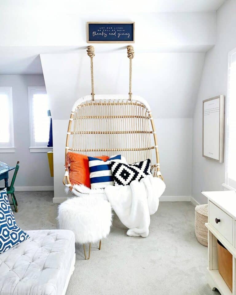 Rattan Egg Chair Suspended From the Ceiling