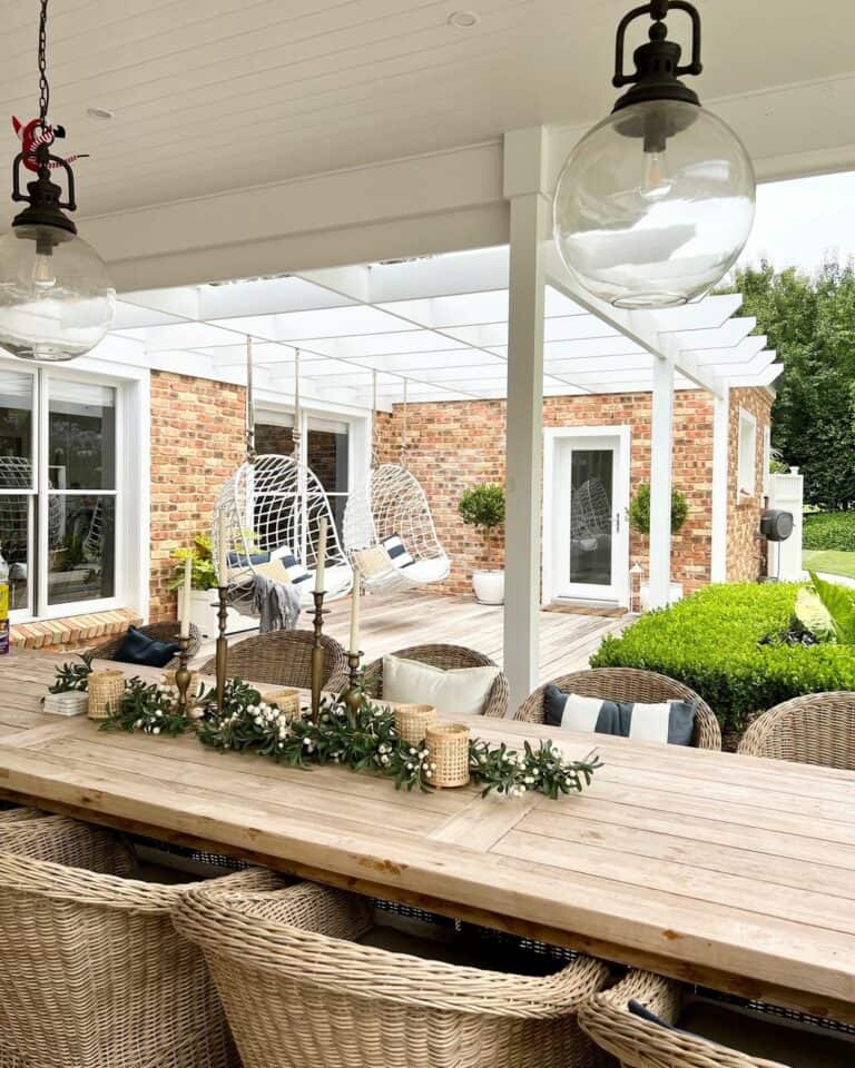 Rattan Seating Under White Pergola