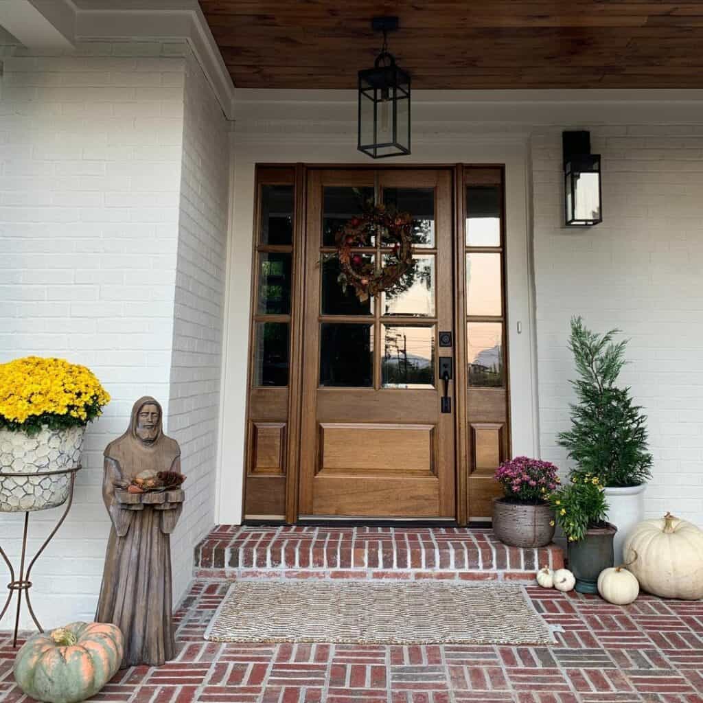 Red Brick Step Leading to Dark Stained Front Door