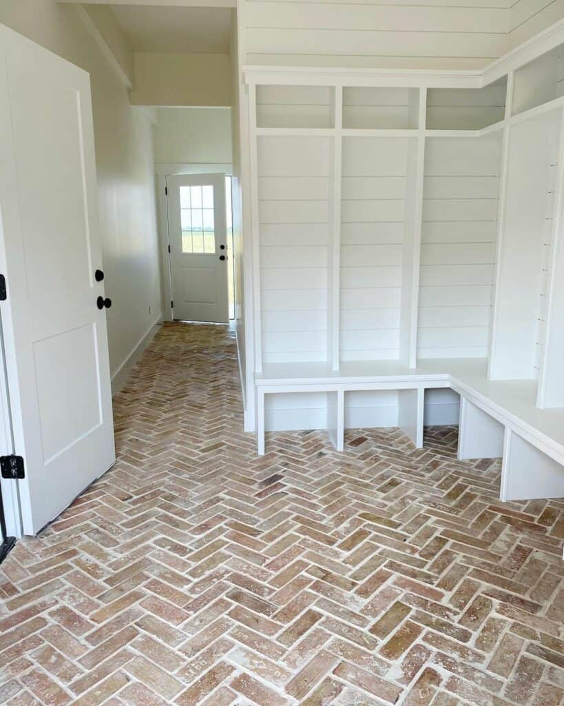Red Floor Tiles and White Shiplap Walls