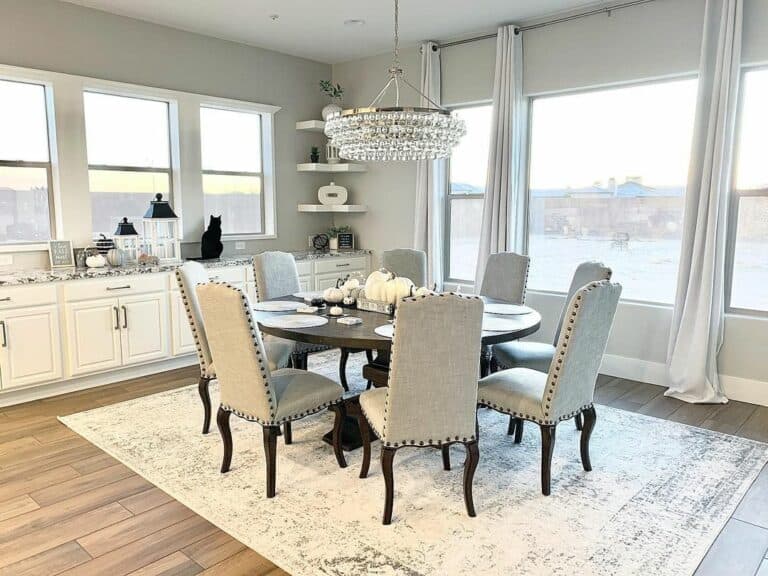 Round Dark Wood Table With Crystal Chandelier