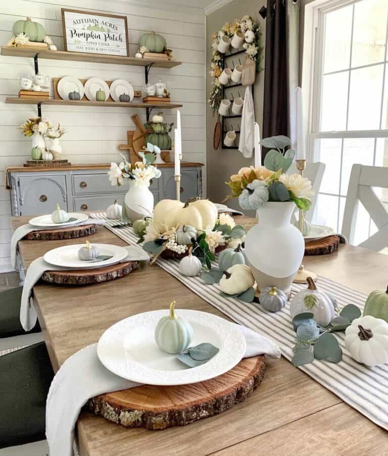 Rustic Dining Area Decorated With Pumpkins