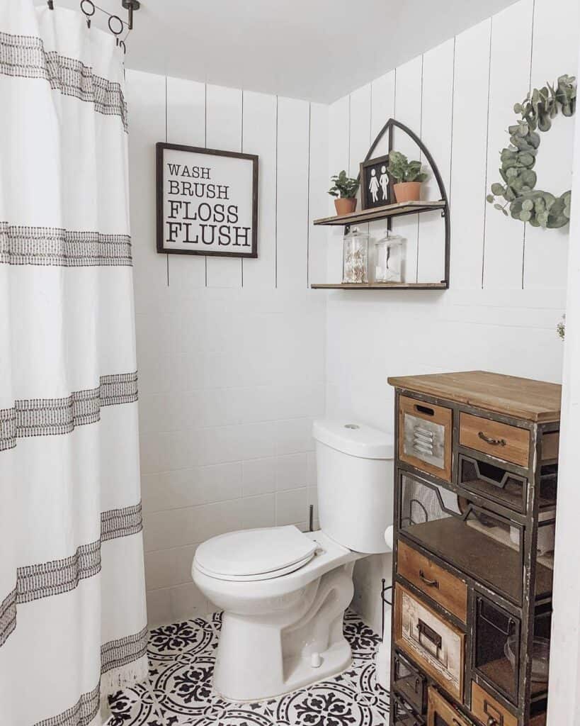 Rustic Farmhouse Bathroom With Black and White Pattern Flooring