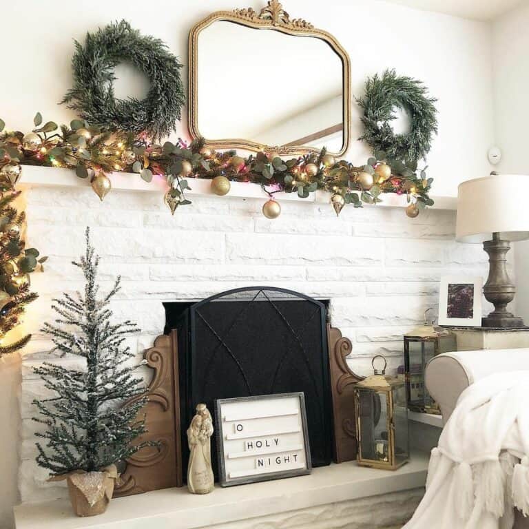 Rustic White Fireplace With Christmas Lanterns