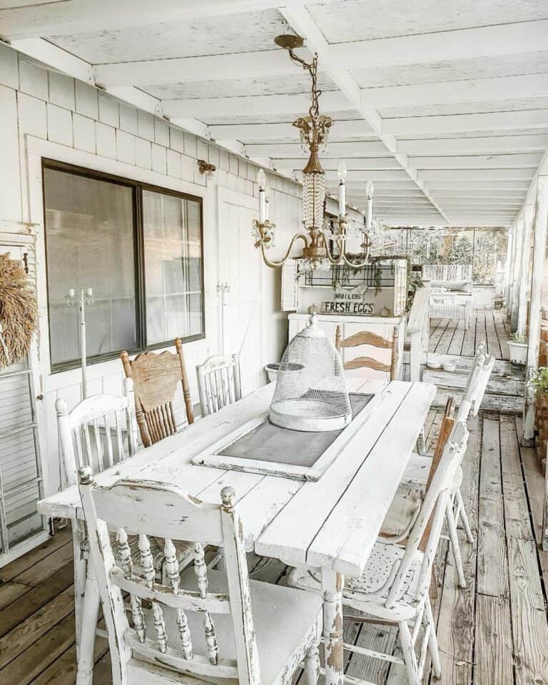 Rustic White Veranda With Outdoor Dining