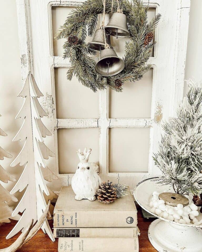 Silver Bells and a White Owl on Vintage Books