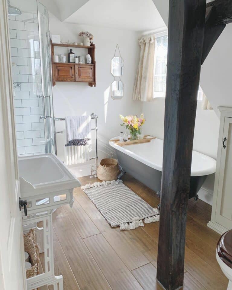 Small Elegant Farmhouse Bathroom With a Plank Wood Bathroom Flooring