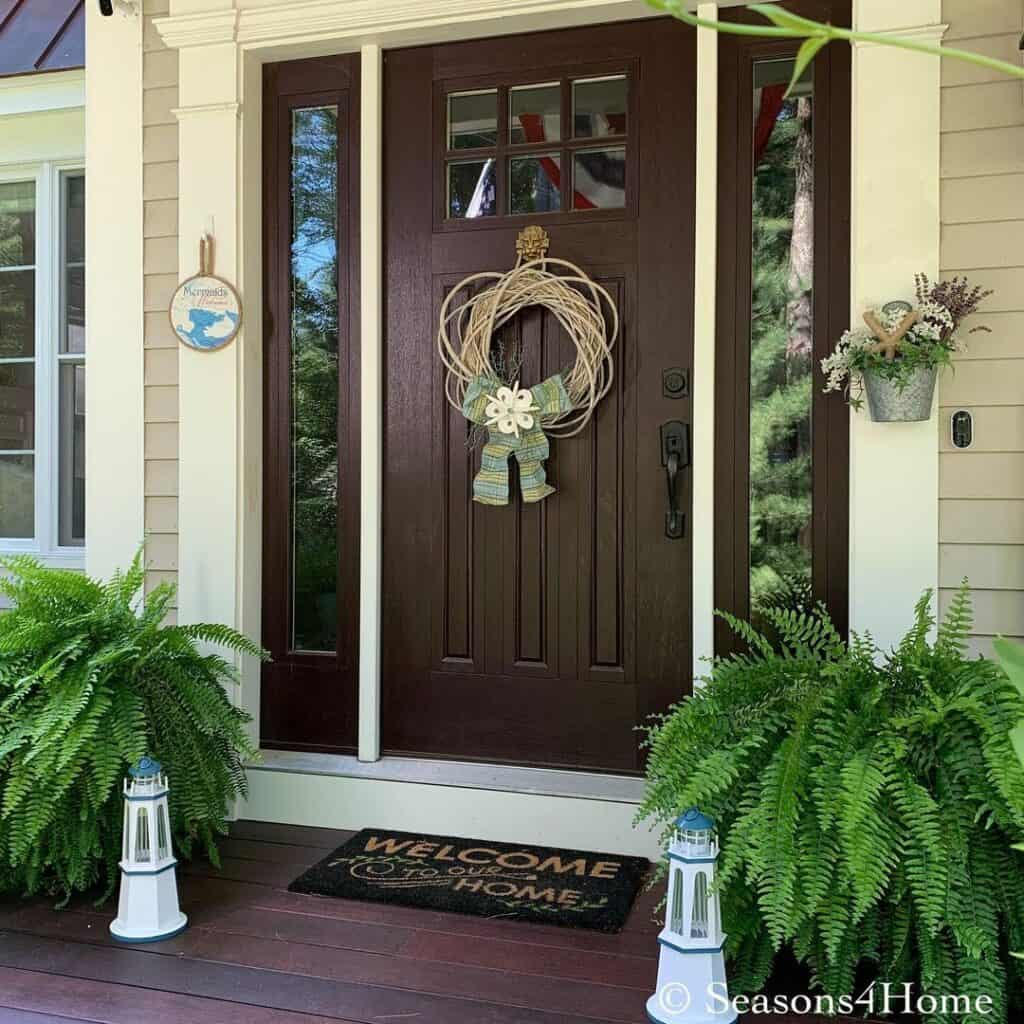 Small Porch With Brown Front Door