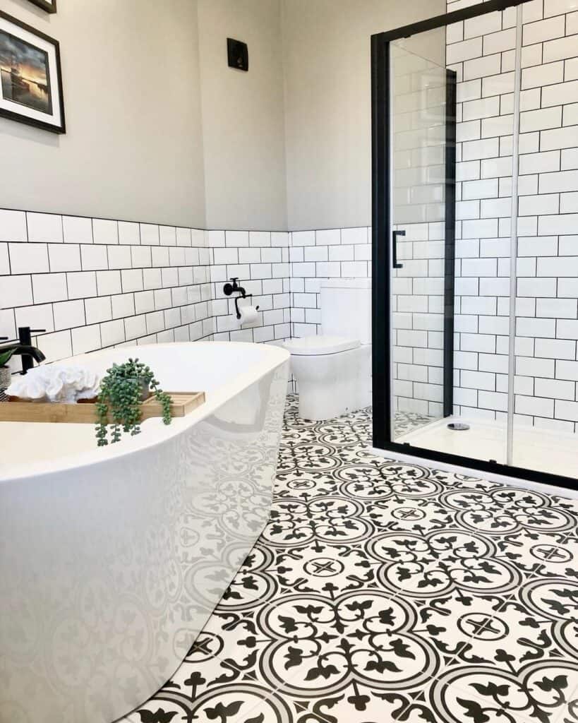 Striking Black and White Patterned Tile Bathroom Flooring