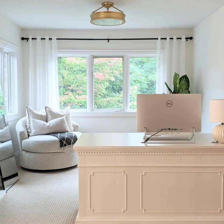 Swanky Open Home Office With an Ivory Round Chair