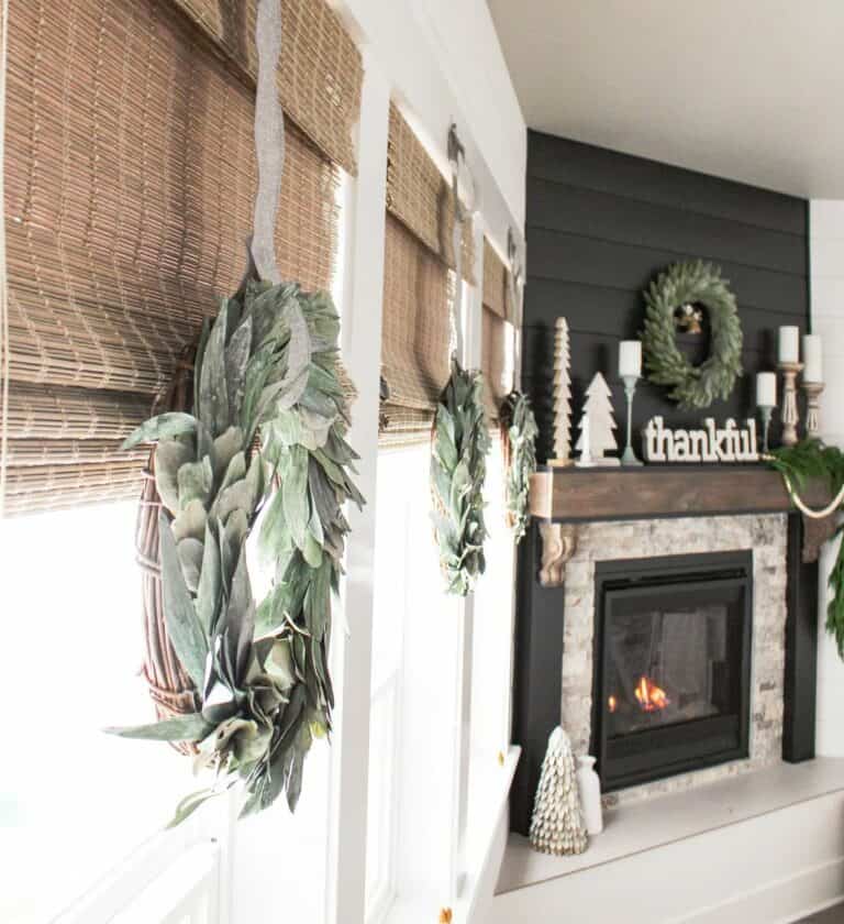 Three Windows With Green Wreaths