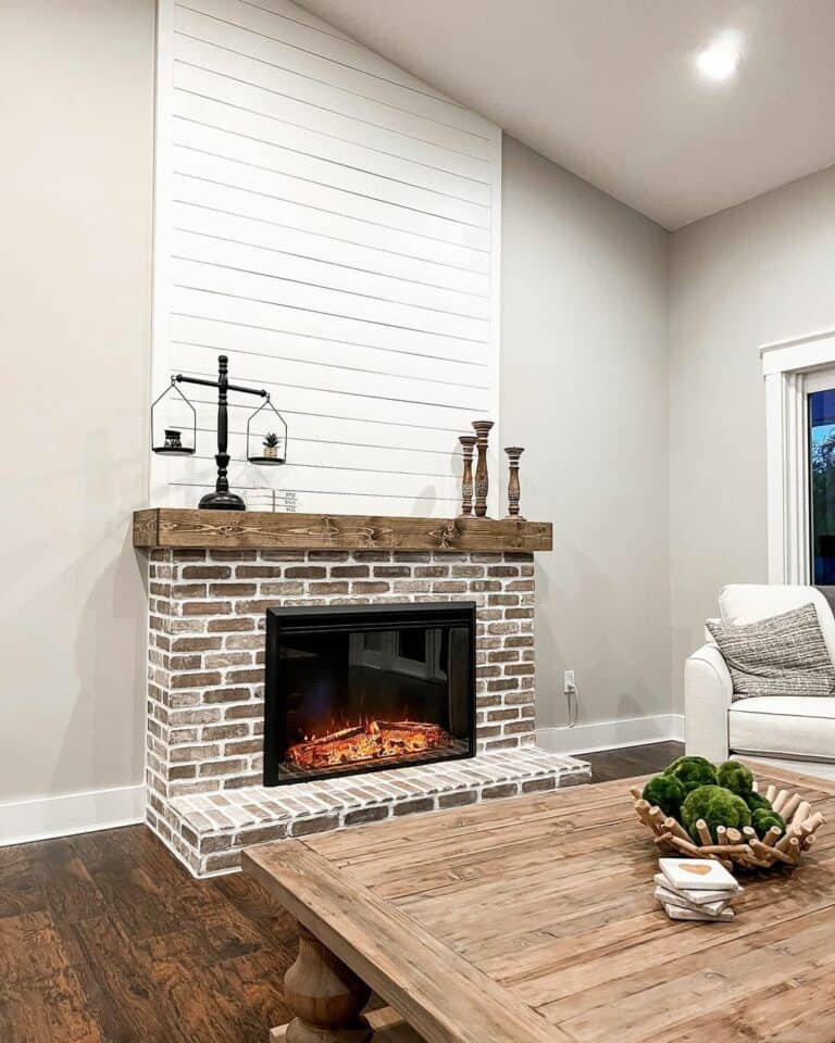 Timber Mantel Against White Shiplap