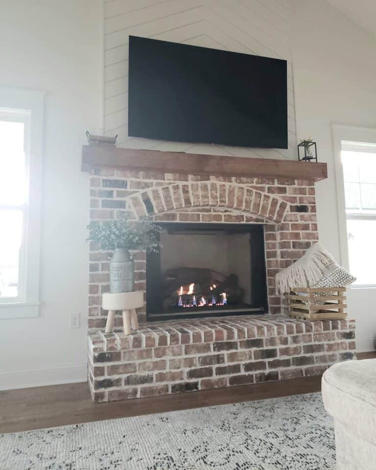 Timeless Raised Brick Fireplace