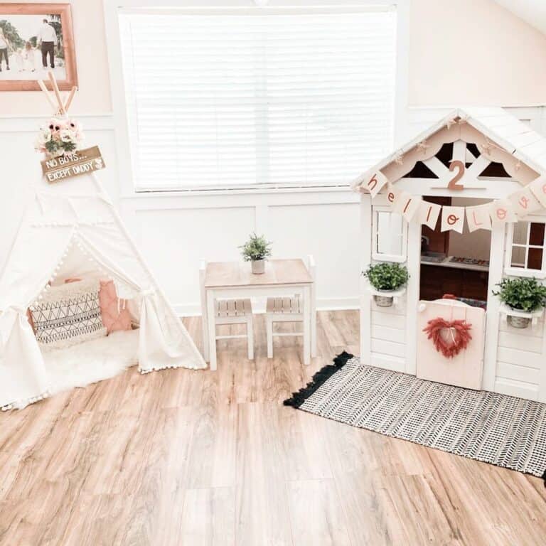 Tiny Table Between a Teepee and a Playhouse