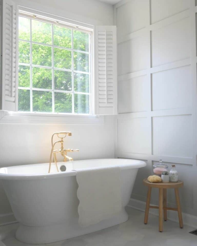 Tranquil Bathroom With White Window Accent Grids