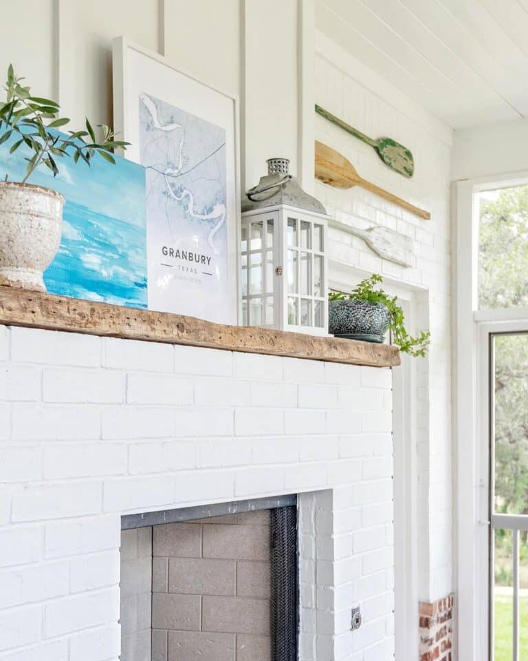 Travel-inspired Touches for White Fireplace