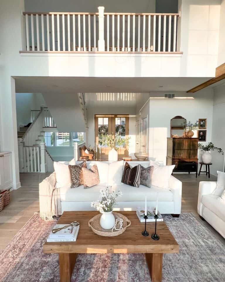 Two-story Living Room Layout With White Couches