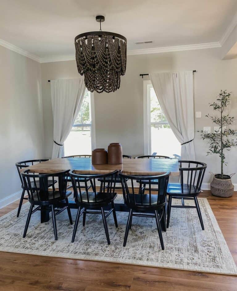 Two-toned Wood Dining Table With Gray Beaded Chandelier