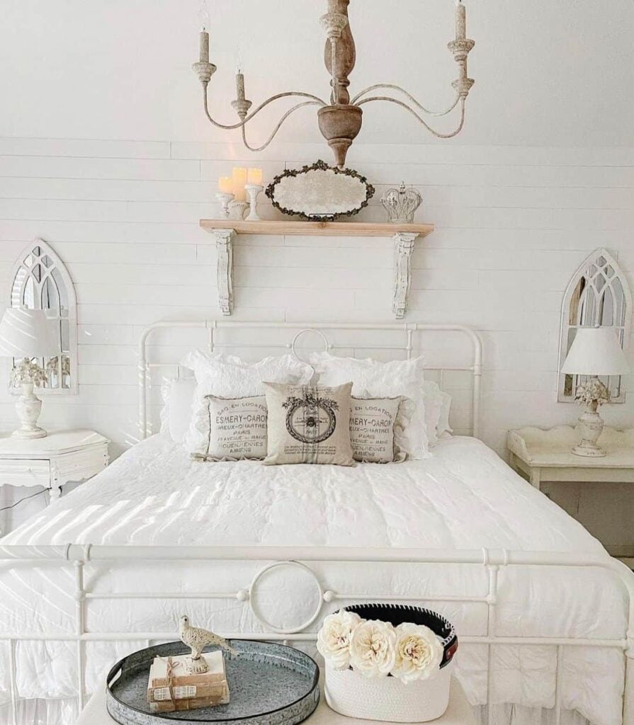 Vintage Bedframe and Décor Centered Along a Shiplap Wall