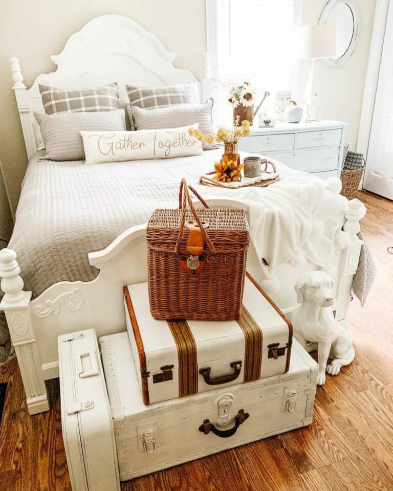Vintage Suitcases at the Foot of a Bed